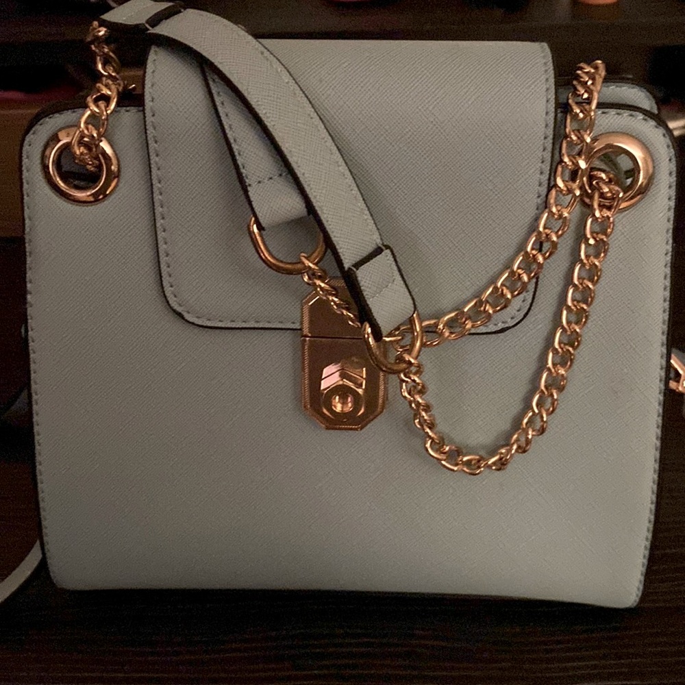 Medium sized bag, light blue, with gold detailing